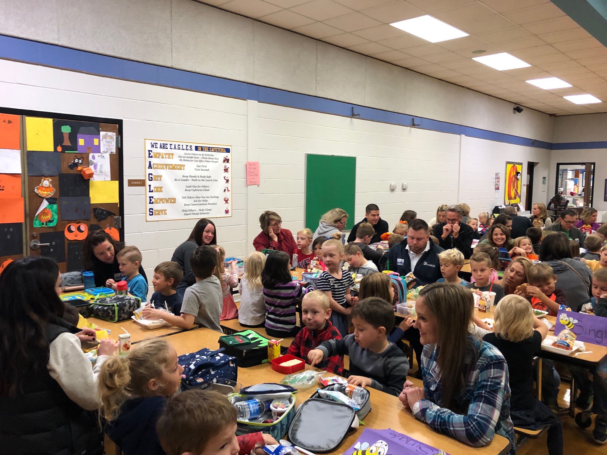 parents and students in lunch room